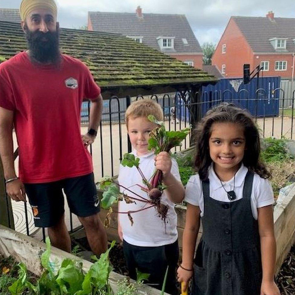 Shuranjeet Singh with some of St Michael's School gardeners