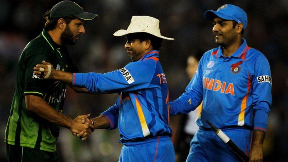 Captain Shahid Afridi of Pakistan congratulates Sachin Tendulkar of India after India defeated Pakistan during the 2011 ICC World Cup second Semi-Final between India and Pakistan at Punjab Cricket Association (PCA) Stadium on March 30, 2011 in Mohali, India.