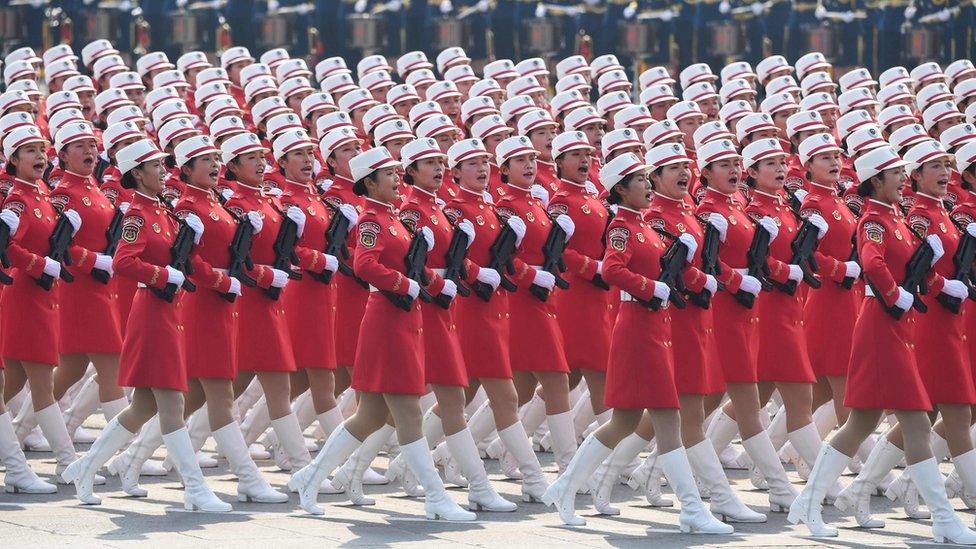 Chinese troops march during a military parade in Tiananmen Square in Beijing on October 1,