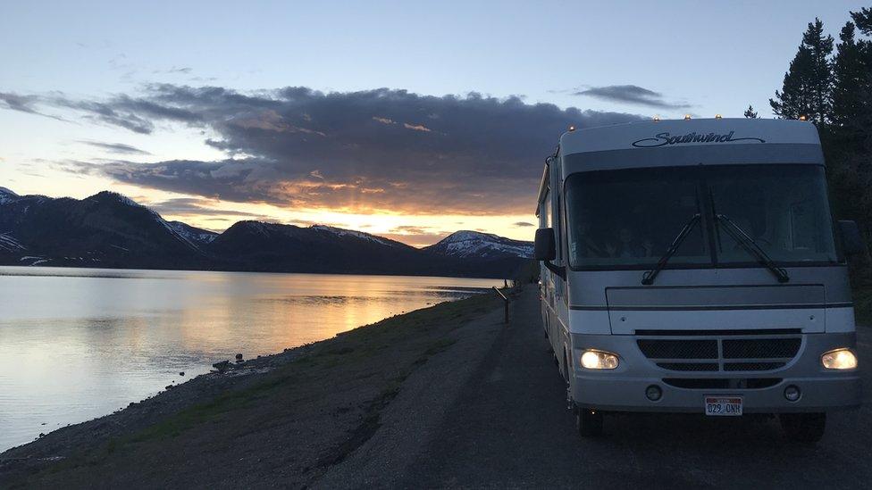 Alyssa Hulme's rented RV parked next to a lake.