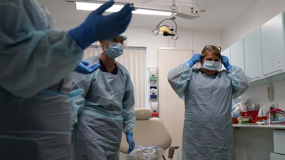 Nurses wearing protective equipment