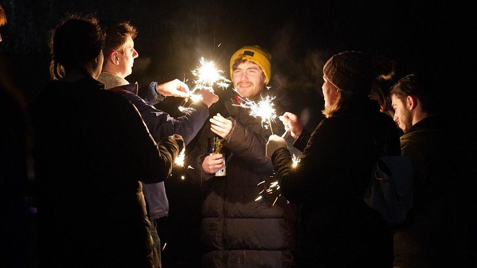 Revellers on Carlton Hill light sparklers during the Hogmanay New Year celebrations in Edinburgh. Picture date: Sunday January1, 2023