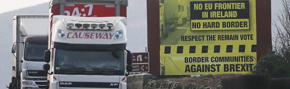 A truck passes a Brexit billboard in Jonesborough, County Armagh