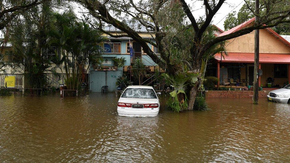 Floodwaters inundate a street in the New South Wales town of Lismore