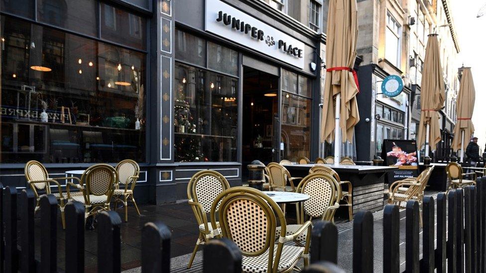 Cardiff Wales, Boxing Day 2021 Empty tables outside the Juniper Place bar