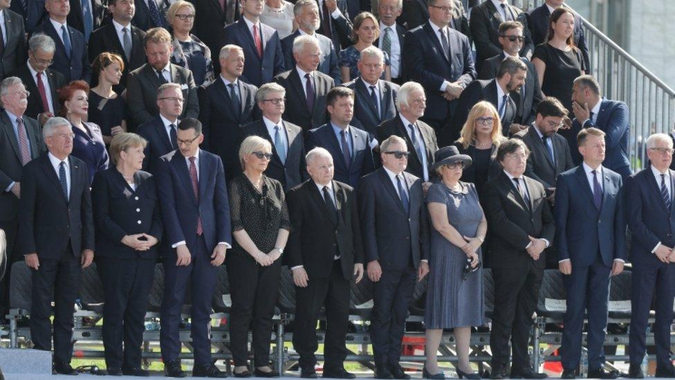 Leaders and officials attend the commemorative ceremony in Warsaw