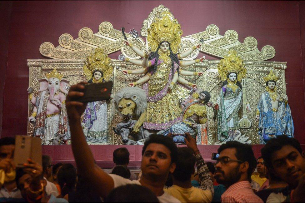 An idol of the Hindu goddess Durga in a sari made out of pure gold