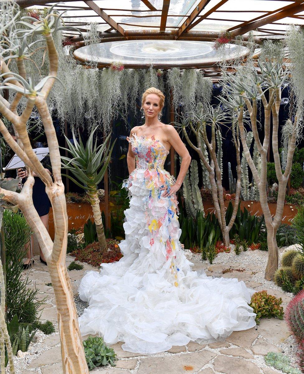 World champion free-diver Tanya Streeter poses at The Pearlfisher Garden, wearing a dress designed by BA Fashion and Textiles students from the University of Brighton.