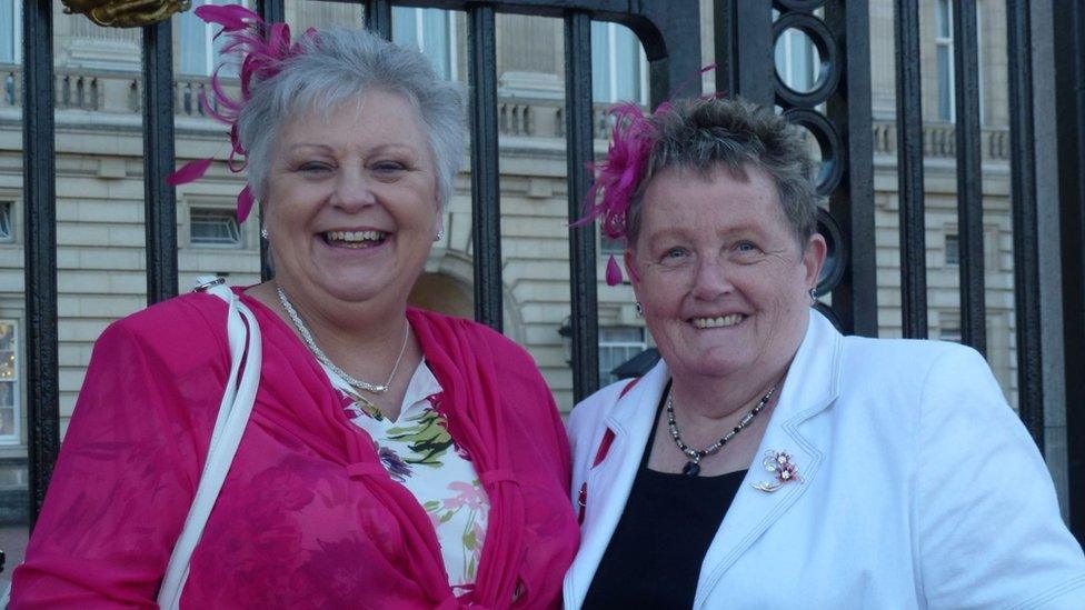 Marilyn and Glennis Hooper outside the gates of Buckingham Palace in 2015 where they had been invited to a Royal garden party