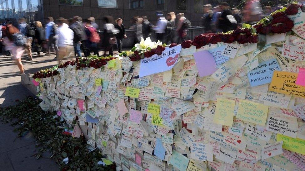 Messages of condolence on wall