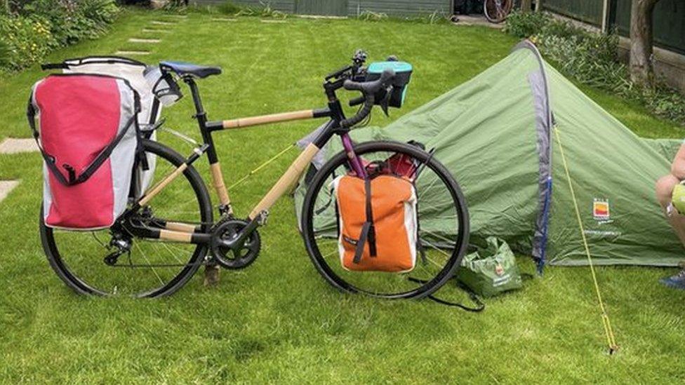 Ms Strong's bamboo bike and tent