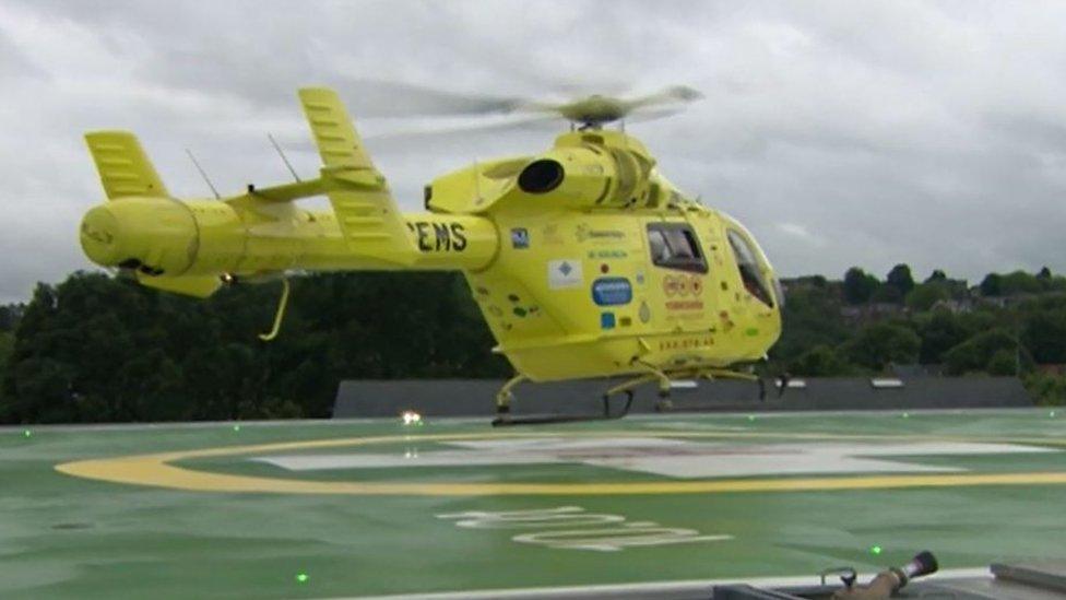 Helicopter landing at helipad