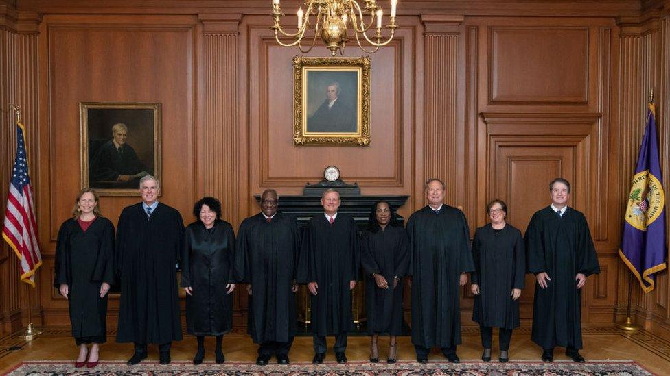 In this handout provided by the Collection of the Supreme Court of the United States, Members of the Supreme Court (L-R) Associate Justices Amy Coney Barrett, Neil M. Gorsuch, Sonia Sotomayor, and Clarence Thomas, Chief Justice John G. Roberts, Jr., and Associate Justices Ketanji Brown Jackson, Samuel A. Alito, Jr., Elena Kagan, and Brett M. Kavanaugh pose in the Justices Conference Room prior to the formal investiture ceremony of Associate Justice Ketanji Brown Jackson September 30, 2022 in Washington, DC