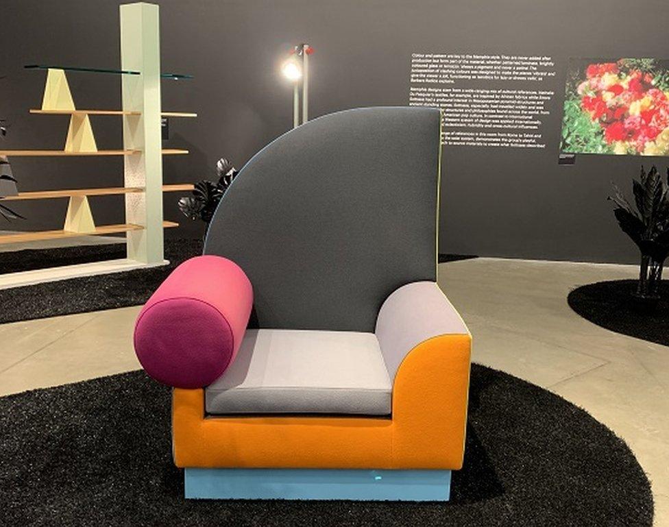 The "Bel Air" armchair by Peter Shire (1982) embodies the Memphis style with its asymmetrical shape and contrasting colours