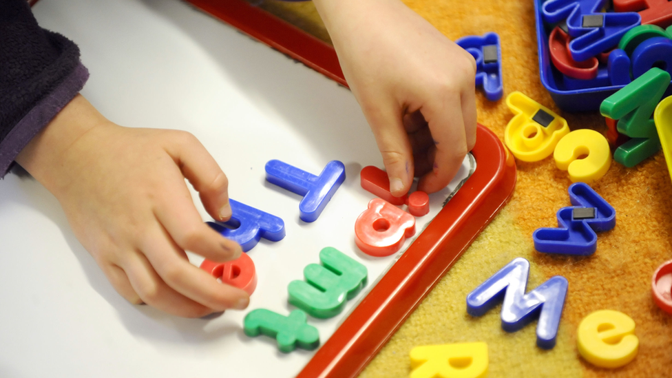 Magnets with a child's hands