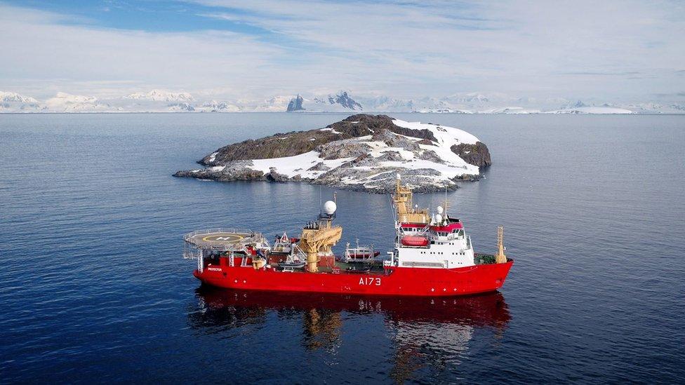 HMS Protector sails close to Fizkin Island.