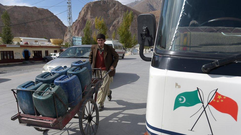 Bus with Chinese and Pakistani flags