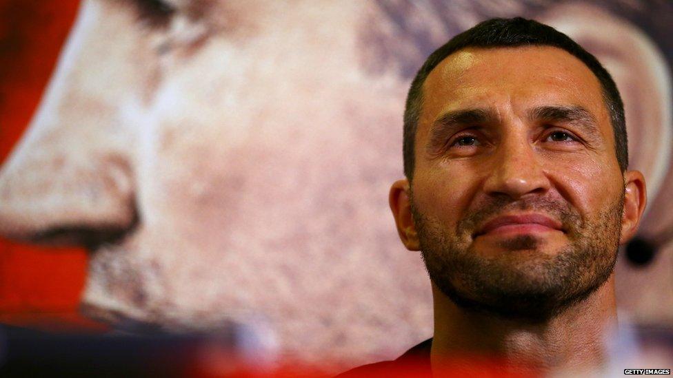 Wladimir Klitschko poses for photographers