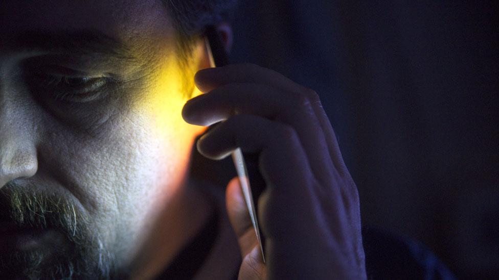 A man using a mobile phone (stock image)