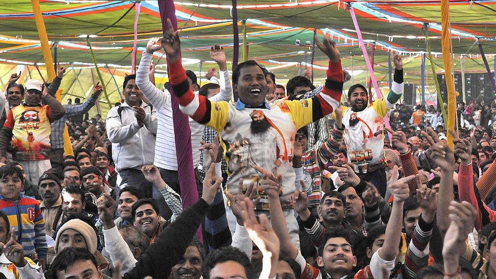 Followers of Dera Saccha Sauda chief Gurmeet Ram Rahim Singh gathered for the premiere of the movie MSG - The Messenger of God at Leisure Valley Ground on January 16, 2015 in Gurgaon, India.