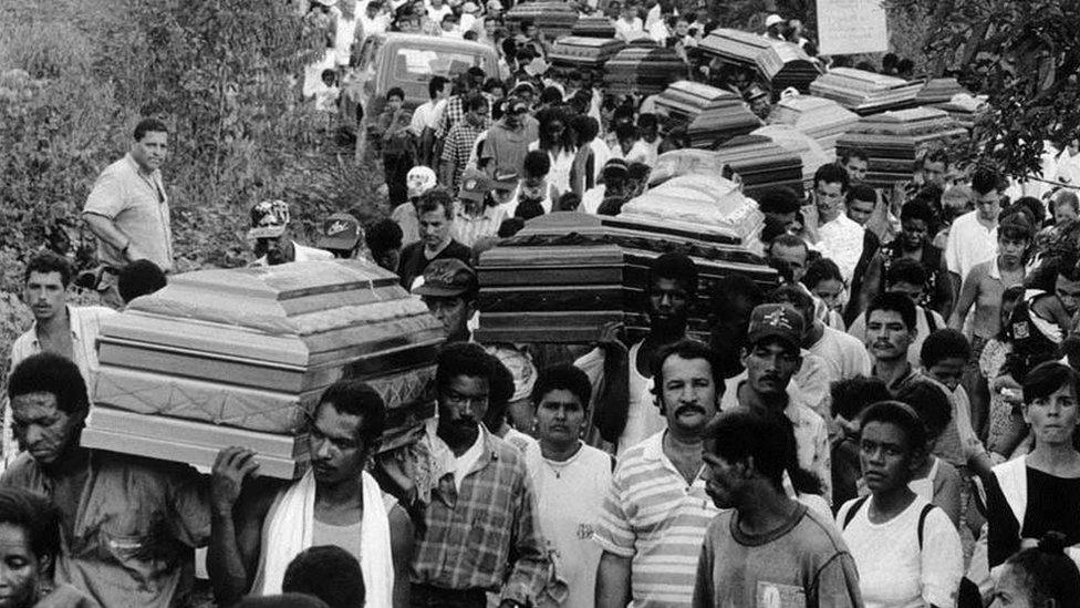 Collective burial of victims of an ELN (National Liberation Army) guerrilla attack on a pipeline in 1998