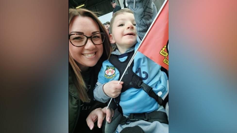 Charlotte and Louis at a Wrexham game