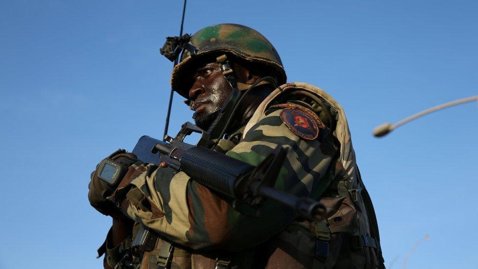 A member of the ECOWAS regional force is seen at Denton check point in Banjul, Gambia on 22 January