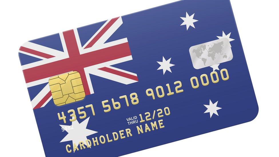 A credit card with an Australian flag background