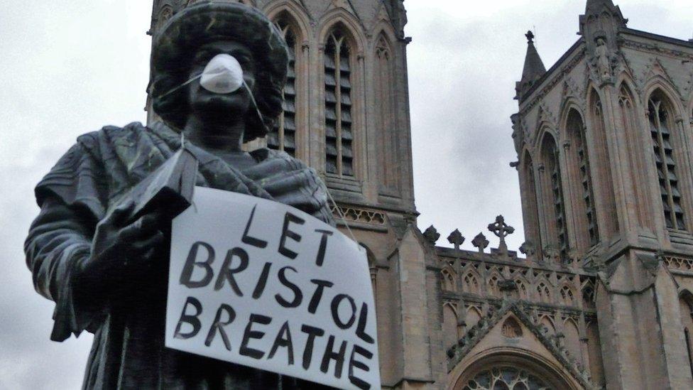 Statue in dust mask