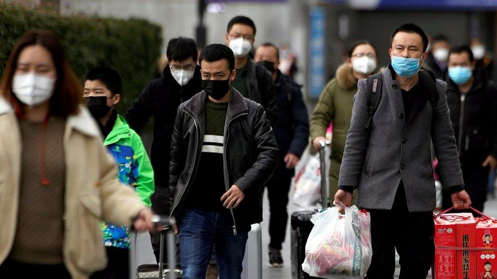 People wearing medical masks in Shanghai