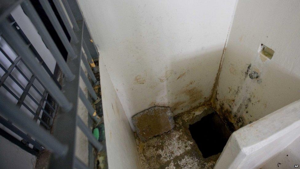 This photo shows the shower area where authorities claim drug lord Joaquin "El Chapo" Guzman, slipped into a tunnel to escape from his prison cell at the Altiplano maximum security prison, in Almoloya, west of Mexico City, Wednesday, July 15, 2015.