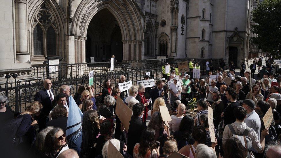 Just Stop Oil protesters outside the Royal Courts of Justice in London, where activists Morgan Trowland, 40, and Marcus Decker, 34, are appealing their jail sentences