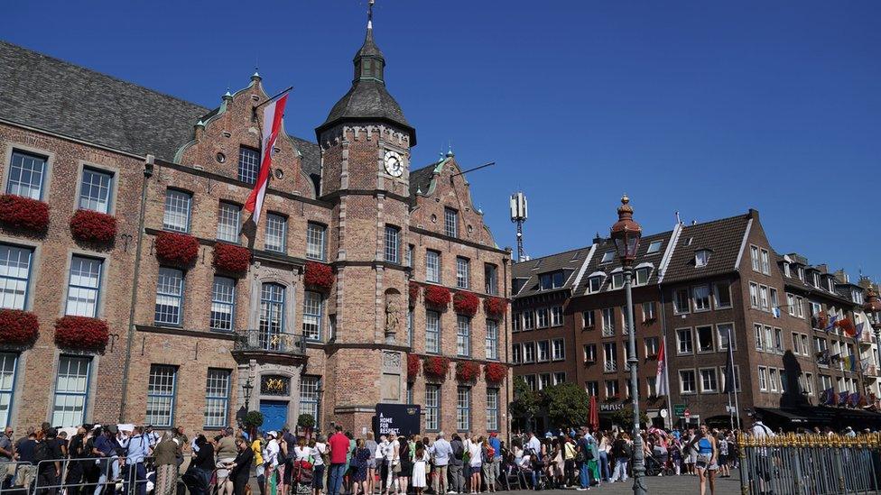 Crowds gather outside Dusseldorf City Hall