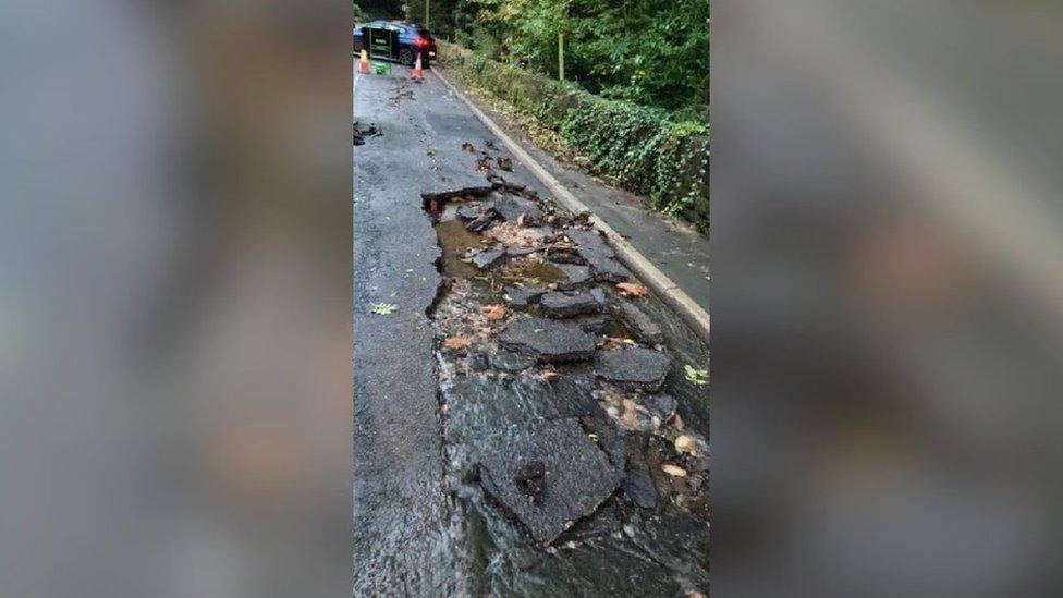 Burst water pipe on the B5035 Crich Road, between Whatstandwell and Crich, in Derbyshire