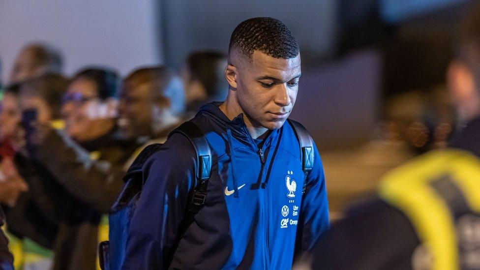 Kylian Mbappe looks sad