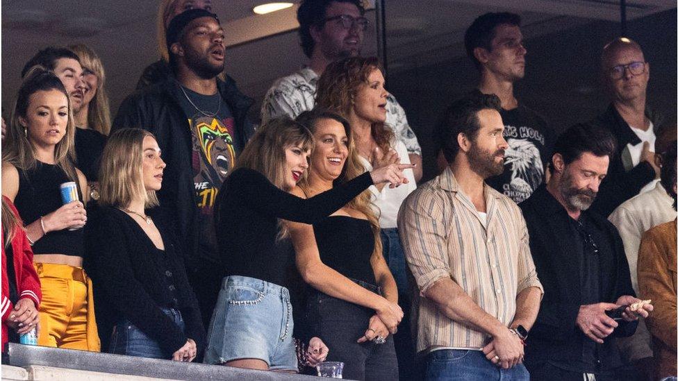 Ryan Reynolds, Blake Lively and Hugh Jackman appear at a Kansas City Chiefs game in New Jersey with Taylor Swift