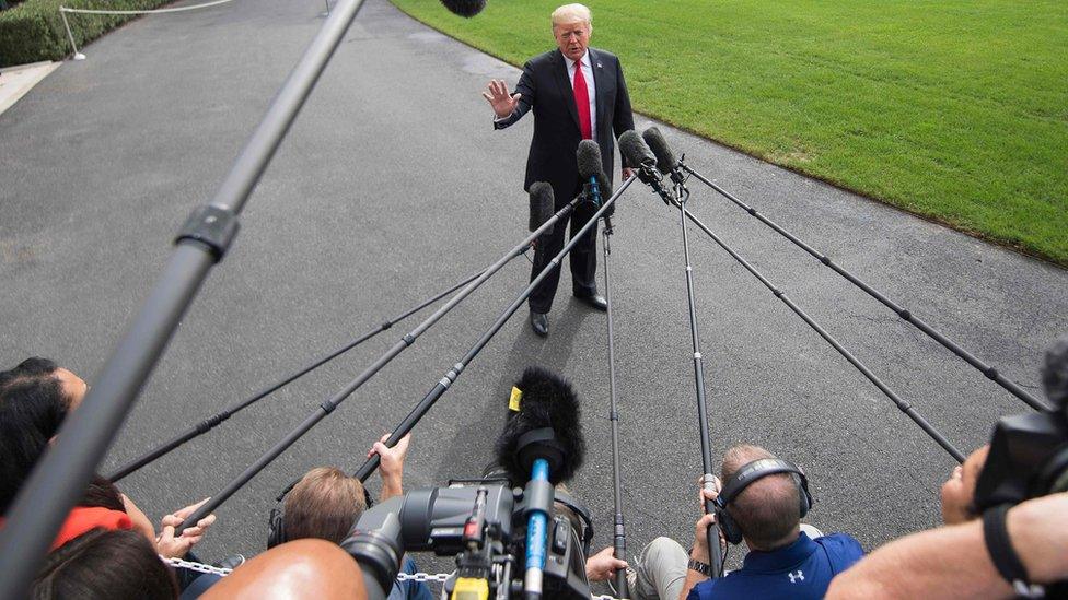 President Donald Trump speaks to reporters