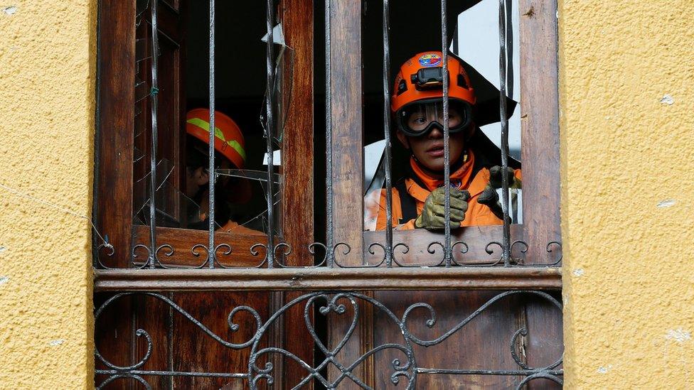 Rescuers work the scene where an explosion occurred near Bogota"s bullring, Colombia, 19 February