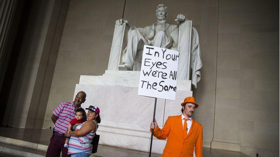 Zach Vance, from Utah County, Utah, poses for a photo in front of the Lincoln Memorial, before the start of the Juggalo March, September 16, 2017 in Washington, DC