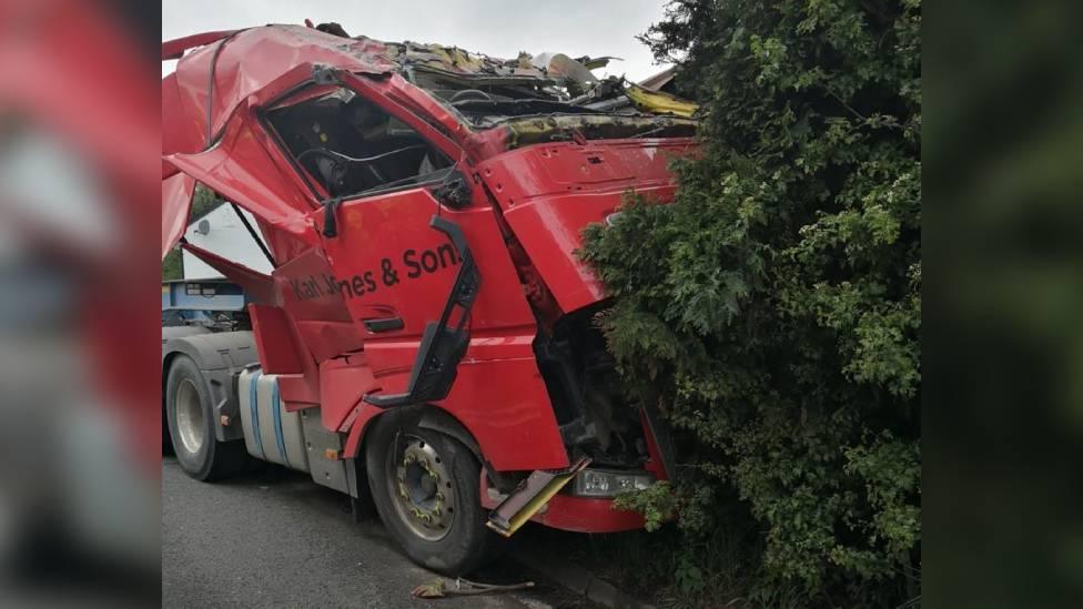 Lorry with its cab crushed