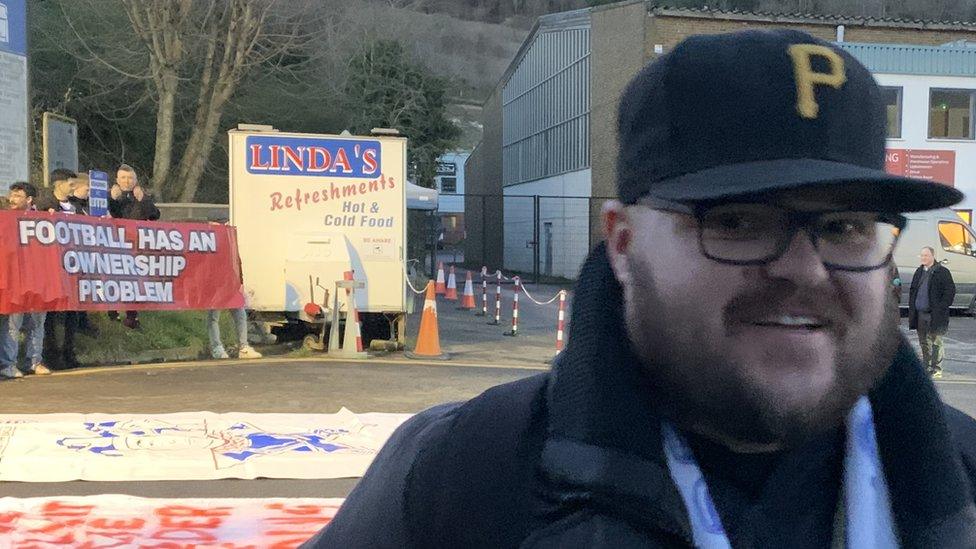 Football fan at protest