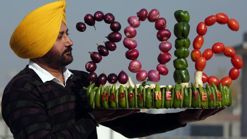 Indian artist Harwinder Singh Gill displays his new vegetable artwork made with vegetables on New Year" Eve in Amritsar, India, 31 December 2015