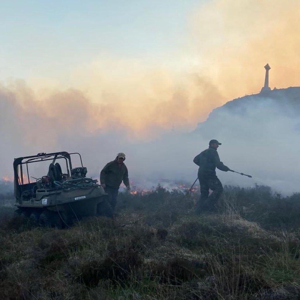 Gamekeepers fighting the fire