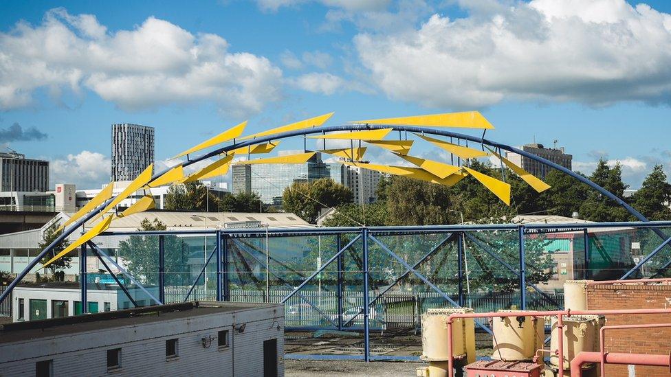 The yellow "meshchips" part of the sculpture