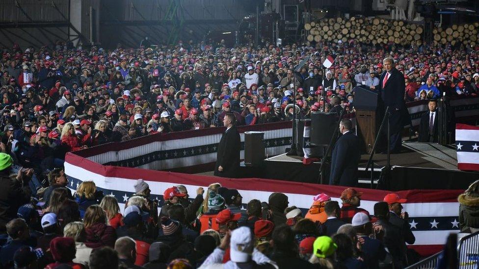 Few attendees wore masks at Mr Trump's rally in Duluth