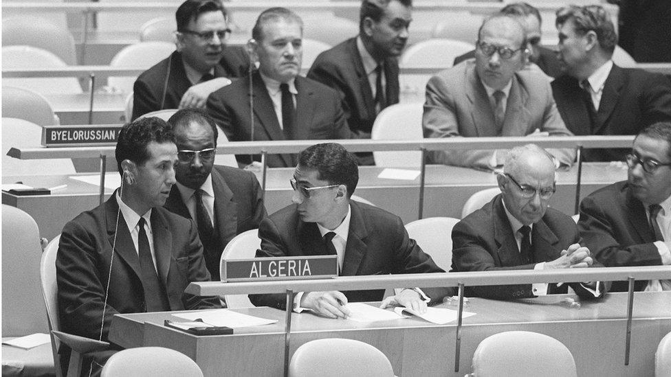 Prime Minister Ahmed Ben Bella (L) and members of the Algerian delegation talk together, United Nations, New York, 10 October 1962.