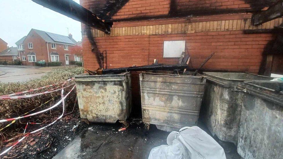 Fire damaged communal bins