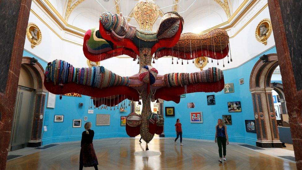 Joana Vasconcelos sculpture, entitled Royal Valkyrie, dominates the entrance hall