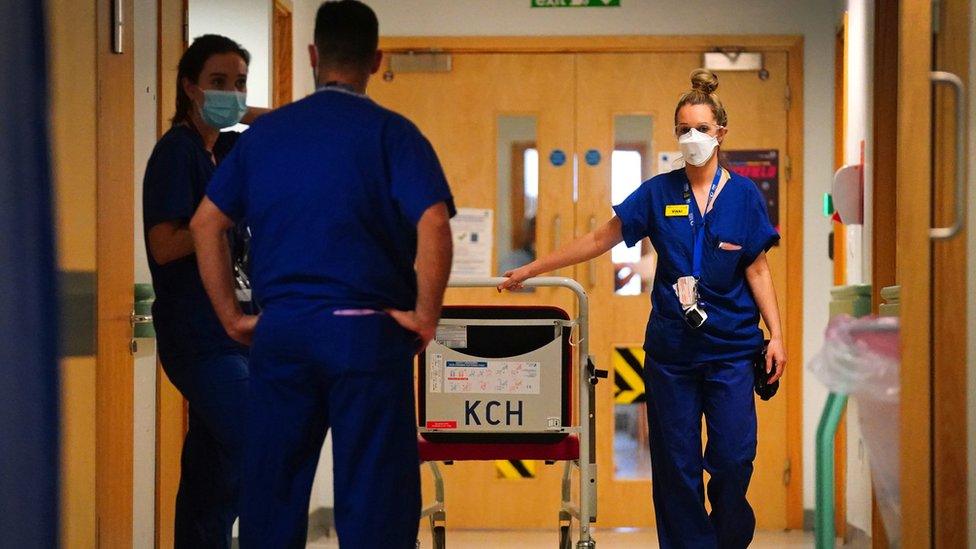 Medical staff wearing PPE on the labour ward at King"s College Hospital, in south east London. Picture date: Tuesday December 21, 2021.