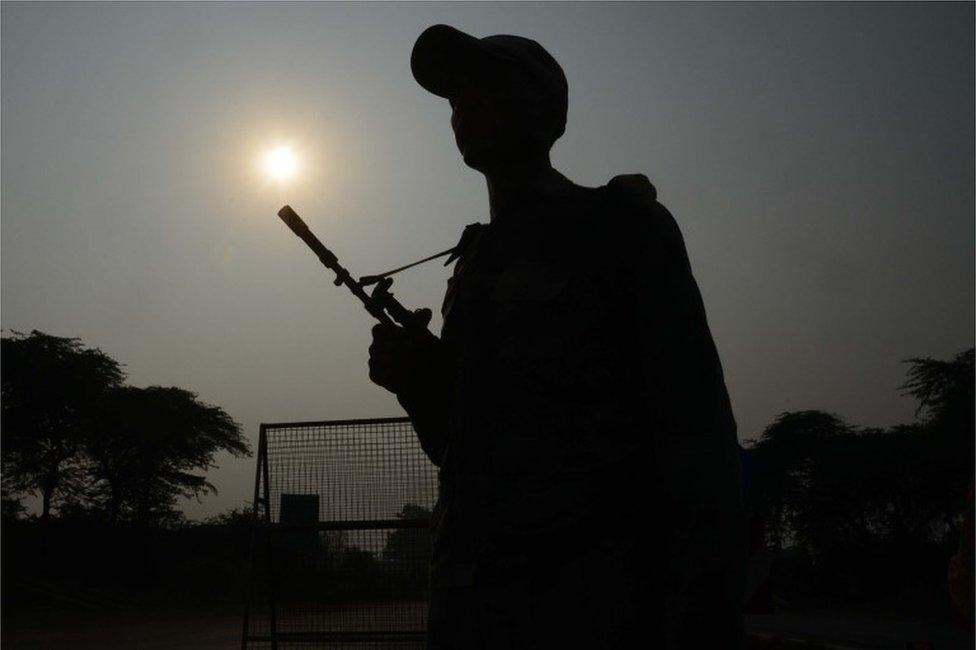 Indian Border Security Force (BSF) personnel stand guard at the India-Pakistan Wagah Border, about 35 km from Amritsar on September 29, 2016, after the Punjab state government issued a warning to villagers to evacuate from a 10 km radius from the India-Pakistan border. Indian commandos carried out a series of lightning strikes September 29 along the de facto border with Pakistan in Kashmir, provoking furious charges of "naked aggression" from its nuclear-armed neighbour.